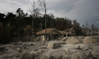 This photo was taken on February 28, 2015 shows a house collapsed due to the eruption of M...