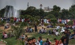 People enjoying in an amusement park after a hot in New Delhi, India, on 7 July 2019. 