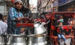 A man waits for the customers at his restaurant in Old Delhi, India, on 7 July 2019. 