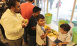 People relish different varieties of mango's during the Mango Festival at Dilli Haat in Ja...
