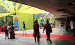 People are seen enjoying various social and cultural activities during the Mango Festival...