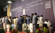 Muslims offer prayers during the 43rd Jalsa Salana (annual convention) of the Ahmadiyya Mu...