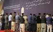 Muslims offer prayers during the 43rd Jalsa Salana (annual convention) of the Ahmadiyya Mu...