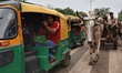 An Ox Cart is seen near a traffic signal in New Delhi, India, on 20 July 2019. 