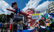 Float with a caricature of British Prime Minister Theresa May arrives in Parliament Square...