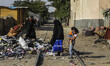 A girl collect the waste in the street of Mokattam (the garbage city of Cairo). "The Garba...