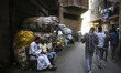 A moment of daily life in the streets of Mokattam (the garbage city of Cairo). "The Garbag...