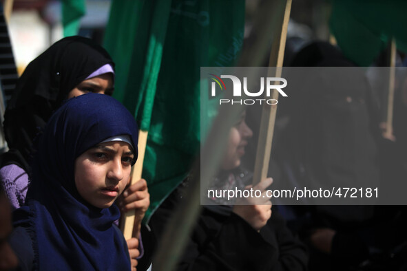 Palestinian Hamas supporters  during a march on the occasion of International Women's Day in Gaza City at the In front of the UN office, in...