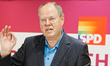 Peer Steinbrück, SPD chancellor candidate for the elections of 2013, hoist the rainbow fla...