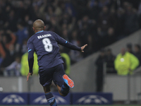 Porto's Algerian midfielder Yacine Brahimi celebrates after scoring a first goal during the UEFA Champions League match between FC Porto and...