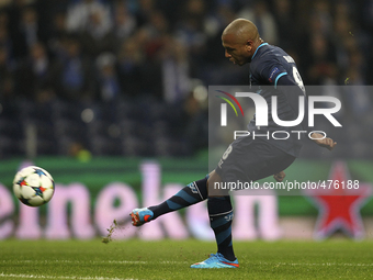 Porto's Algerian midfielder Yacine Brahimi scoring a goal during the UEFA Champions League match between FC Porto and FC Basel, at Dragão St...