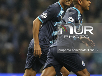 Porto's Algerian midfielder Yacine Brahimi celebrates after scoring a goal during the UEFA Champions League match between FC Porto and FC Ba...