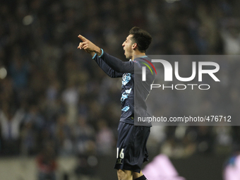 Porto's Mexican midfielder Héctor Herrera celebrates after scoring a goal during the UEFA Champions League match between FC Porto and FC Bas...