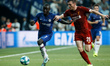 N'Golo Kante (L) of Chelsea and Andrew Robertson of Liverpool vie for the ball during the...