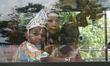 Little children dressed up as Lord Krishna in a bus during the Janmashtami Festival in Mor...