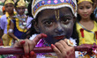 Children dress up as Lord Krishna on the occasion of Janmashtami festival at Morigaon in A...