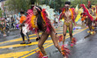 A masquerade performer dances during the 52nd annual West Indian Day Parade Monday Septemb...