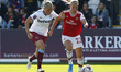 Beth Mead of Arsenal  under pressure from Gilly Flaherty of West Ham United WFCduring Ba...