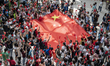 Pro-Beijing Protesters are seen waving a large Chinese Flag inside a shopping mall in Hong...