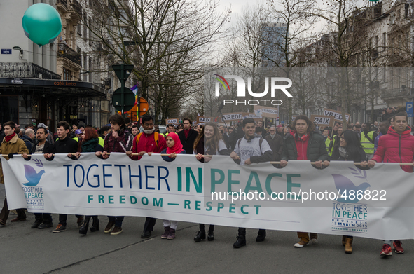 Brussels,Belgium. 15/03/2015: People hold a banner what reads “Together In Peace ,Freedom – Respect. Pictured on the march held in Brussels.... by Jonathan Raa/NurPhoto