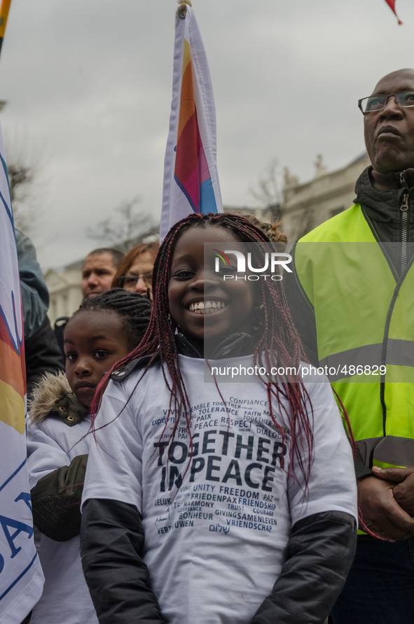 Brussels,Belgium. 15/03/2015: Children are seen with a t-shirt “Together In Peace ,Freedom – Respect. Pictured on the march held in Brussels... by Jonathan Raa/NurPhoto