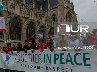 Brussels,Belgium. 15/03/2015: People hold a banner what reads “Together In Peace ,Freedom – Respect. Pictured on the march held in Brussels.... by Jonathan Raa/NurPhoto