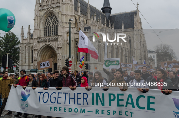 Brussels,Belgium. 15/03/2015: People hold a banner what reads “Together In Peace ,Freedom – Respect. Pictured on the march held in Brussels.... by Jonathan Raa/NurPhoto
