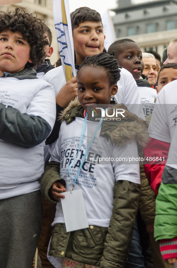 Brussels,Belgium. 15/03/2015: Children are seen with a t-shirt “Together In Peace ,Freedom – Respect. Pictured on the march held in Brussels... by Jonathan Raa/NurPhoto