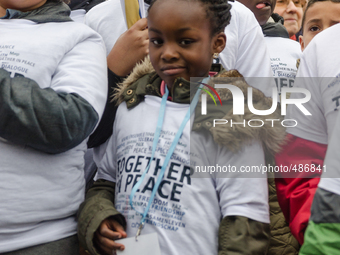 Brussels,Belgium. 15/03/2015: Children are seen with a t-shirt “Together In Peace ,Freedom – Respect. Pictured on the march held in Brussels... by Jonathan Raa/NurPhoto