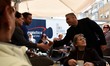 Yair Lapid, leader of 'Yesh Atid' Party and former Israeli Finance Minister talks to local...