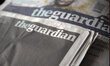 Light shining on copies of The Guardian newspaper, a publication which is regarded to matt...