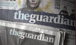 Light shining on copies of The Guardian newspaper, a publication which is regarded to matt...