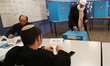 A man casts his ballot at a polling station in Jerusalem on March 17, 2015. Israelis are v...