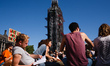 Demonstrators relax in Parliament Square as environmentalists tens of thousands strong tak...