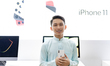 A customer, Abang Zulhusmi (22) holds up two newly purchased iPhone 11 during the Apple iP...