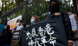 Demonstrators are seen during a rally against Chinese Government on September 29, 2019 in...