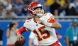 Kansas City Chiefs quarterback Patrick Mahomes (15) looks to pass during the first half of...