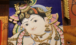 Detail of a decorative artistic display featuring images of various Hindu Gods and Goddess...