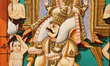 Detail of a decorative artistic display featuring images of various Hindu Gods and Goddess...