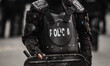 Riot police confront demonstrators during clashes in Quito on October 7, 2019 following da...