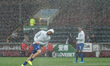 Tom Davies of Everton gets soaked before the Premier League match between Burnley and Ever...