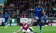 Ben Mee of Burnley tackles Dominic Calvert-Lewin of Everton during the Premier League matc...