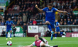 Ben Mee of Burnley tackles Dominic Calvert-Lewin of Everton during the Premier League matc...