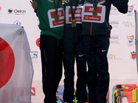 The Kenyan Rose Chelimo (C ), the Portuguese Sara Moreira ( L) and Prisca Jeptoo (R ) in the podium of the Female Lisbon Half-Marathon 2015...