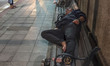 Bangkok, Thailand, 08 October 2019 : A man sleep at the corner street of Bangkok. Daily Li...