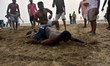 Local boys seen playing 'Kabaddi' at Juhu Beach on October 13, 2019, in Mumbai. 