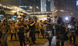Riot Police are seen pointing pepper spray at Members of the Press during a Rally in Hong...