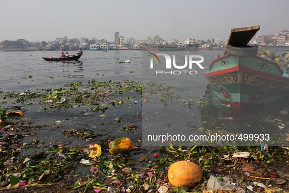 A boat is through the toxic black water at the bank of river Buriganga, Dhaka, Bangladesh, 24 March, 2015. 