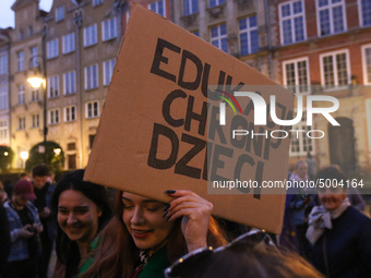 Protester holding sign that says 'Education Saves Children' during the rally against a bill that would criminalize sex education is seen in...