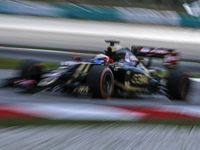 French Romain Grosjean of Lotus F1 Team in action during second practice session of Malaysian Formula One Grand Prix at Sepang Interational...